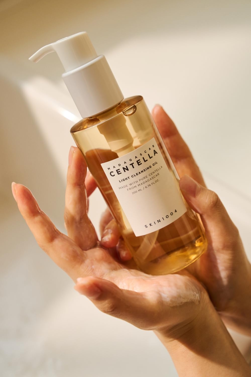 Madagascar Centella Light Cleansing Oil – gentle emulsifying oil cleanser with Centella & botanical oils; removes makeup & sunscreen without greasy residue