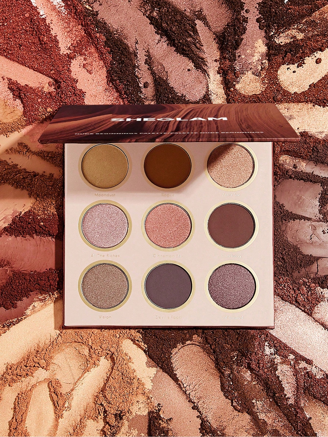SHEGLAM Nude Beginnings Eyeshadow Palette with 9 neutral matte and shimmer shades arranged in a compact nude-toned case

