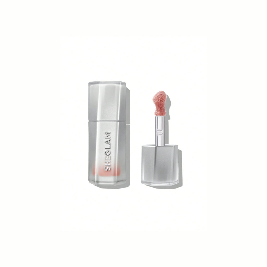 SHEGLAM Glass Lock Air Gloss – Born Ready shade in sleek tube, hydrating mirror-shine lip glaze with natural nude-pink glossy finish
