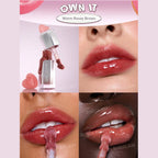 SHEGLAM Glass Lock Air Gloss – Own It, fresh nude-rose high-shine lip gloss in a sleek tube with a glassy, mirror-like finish on a clean background.
