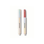 SHEGLAM Pout-Perfect Shimmer Lip Plumper in Pink Flamingo, solid pink glitter lip gloss stick on a clean background.
