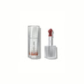 SHEGLAM Glass Lock Air Gloss – Own It, fresh nude-rose high-shine lip gloss in a sleek tube with a glassy, mirror-like finish on a clean background.
