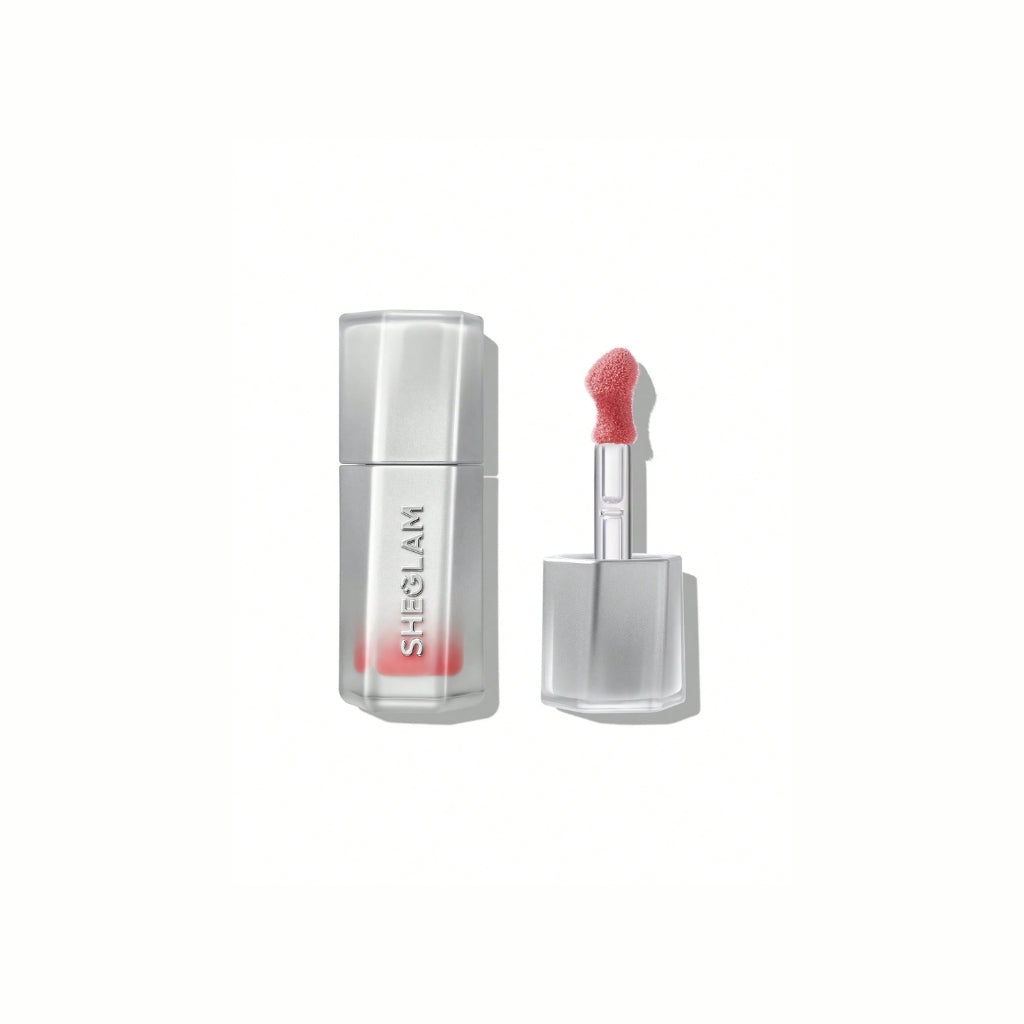 SHEGLAM Glass Lock Air Gloss – Make It Pop, vibrant pink high-shine lip gloss in a sleek tube with mirror-like finish on a clean background.
