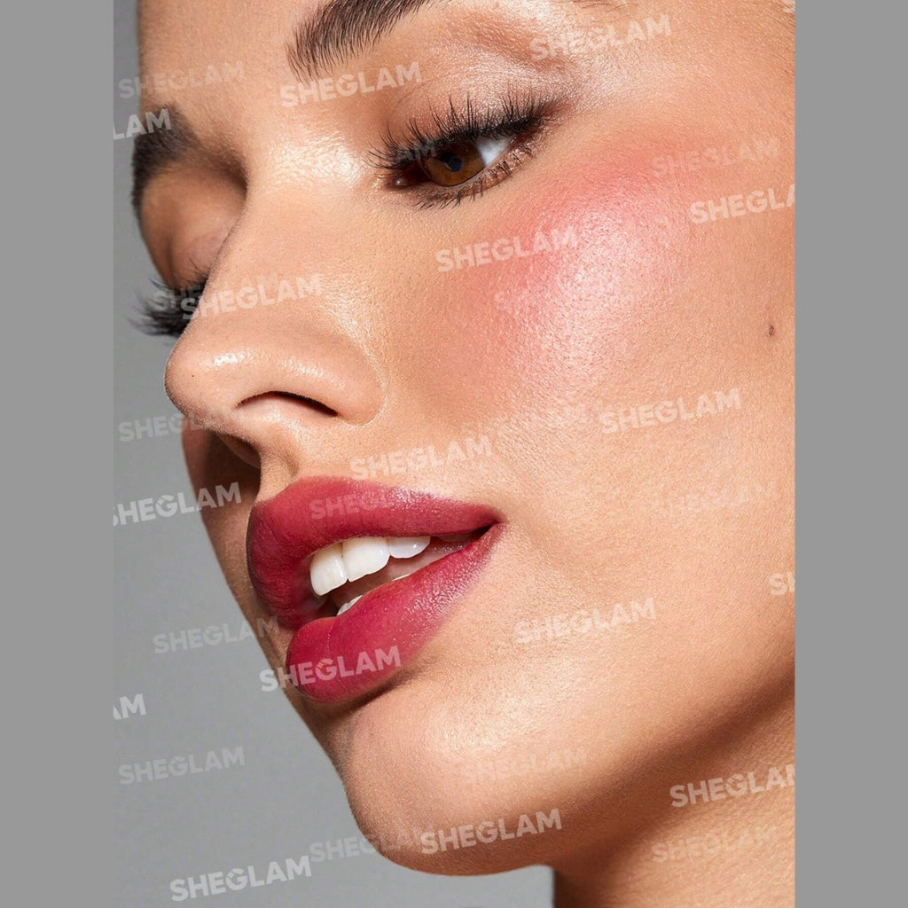 SHEGLAM For The Flush Lip & Cheek Tint – It's Chili, warm rosy-pink liquid tint in a sleek tube for lips and cheeks on a clean background.
