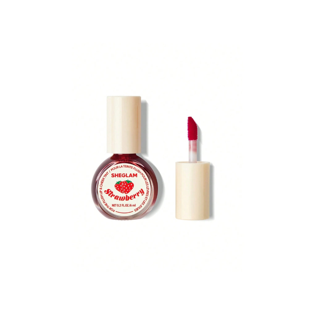 SHEGLAM For The Flush Lip & Cheek Tint – It's Chili, warm rosy-pink liquid tint in a sleek tube for lips and cheeks on a clean background.
