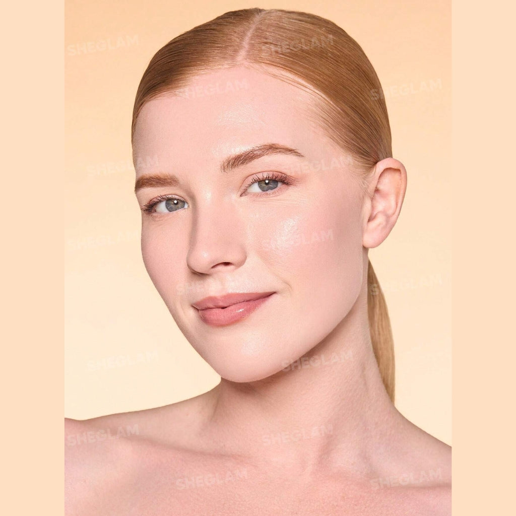 SHEGLAM Dew & Done Skin Tint with SPF20 in Linen shade, dewy light-to-medium coverage skin tint tube on a clean background.

