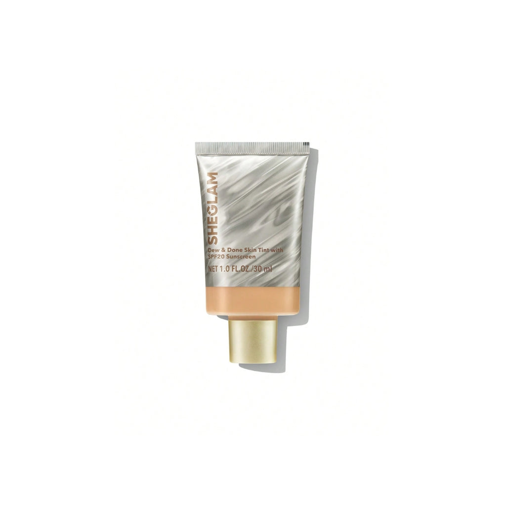 SHEGLAM Dew & Done Skin Tint with SPF20 in Nude shade, dewy light-to-medium coverage skin tint tube on a clean background.

