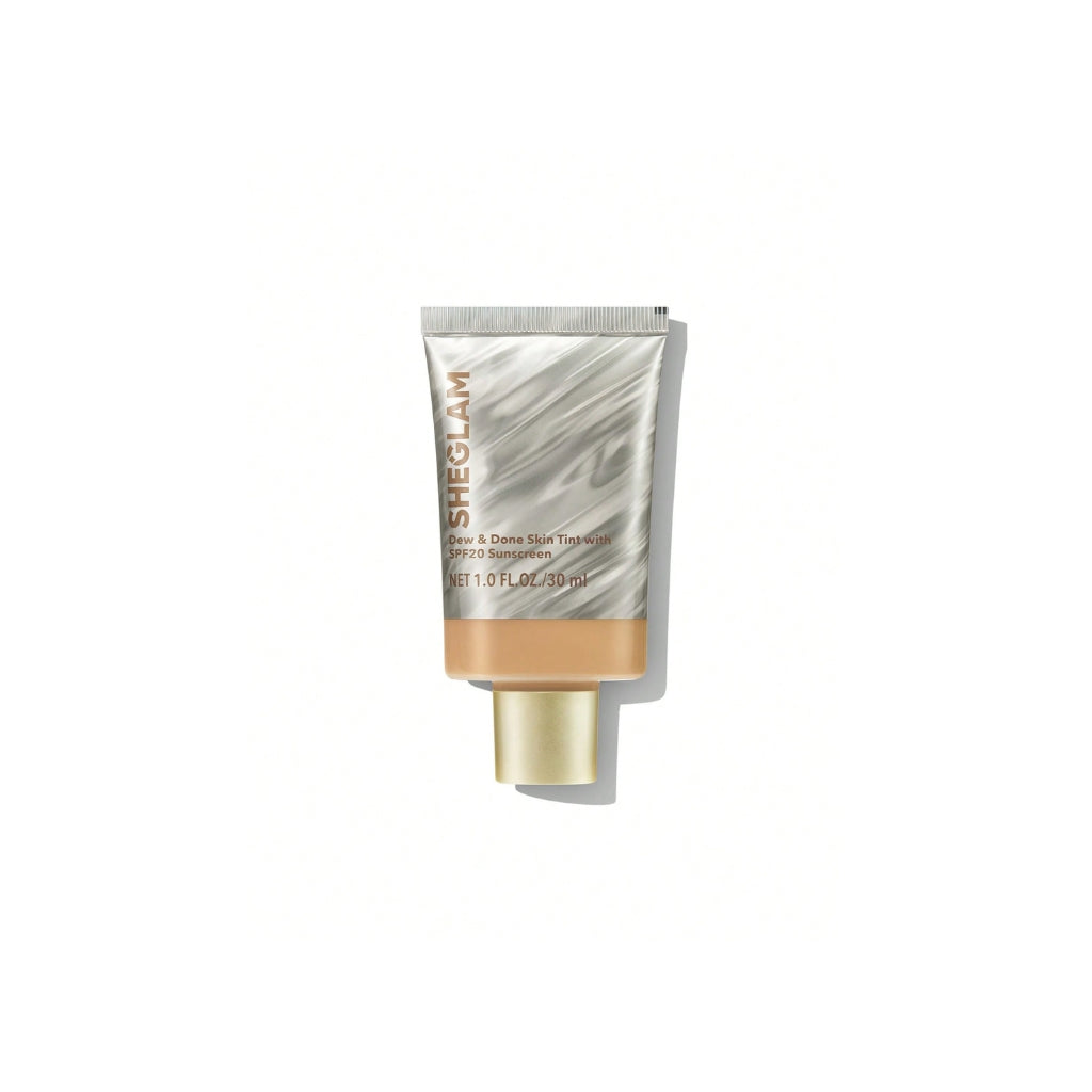 SHEGLAM Dew & Done Skin Tint with SPF20 in Acorn shade, dewy light-to-medium coverage skin tint tube on a clean background.
