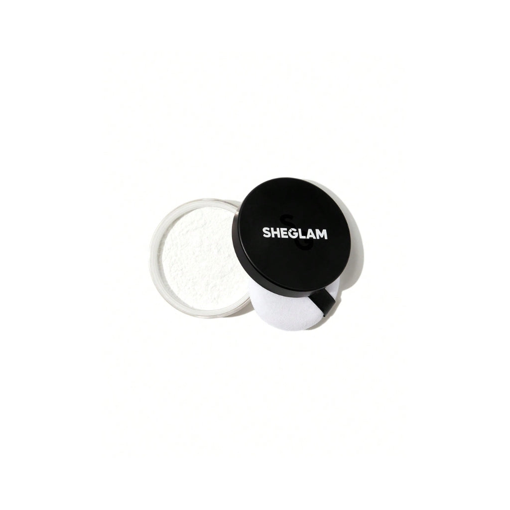 SHEGLAM Baked Glow Setting Powder in Translucent, lightweight talc-free loose setting powder for oil control, blurred pores and soft glow finish.
