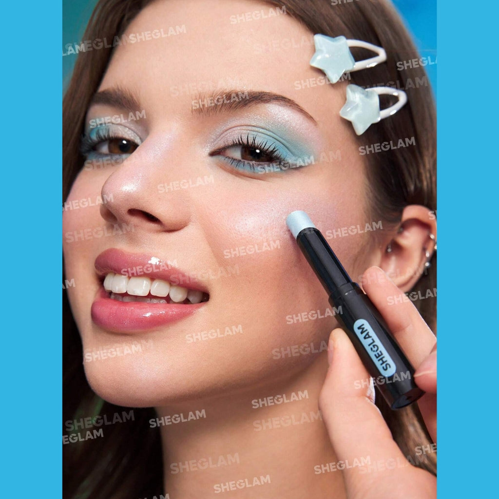 The Powerpuff Girls X SHEGLAM Power-Noia Shimmer Stick in shade Everything Nice, a limited-edition multi-use highlighter stick for face and eyes.
