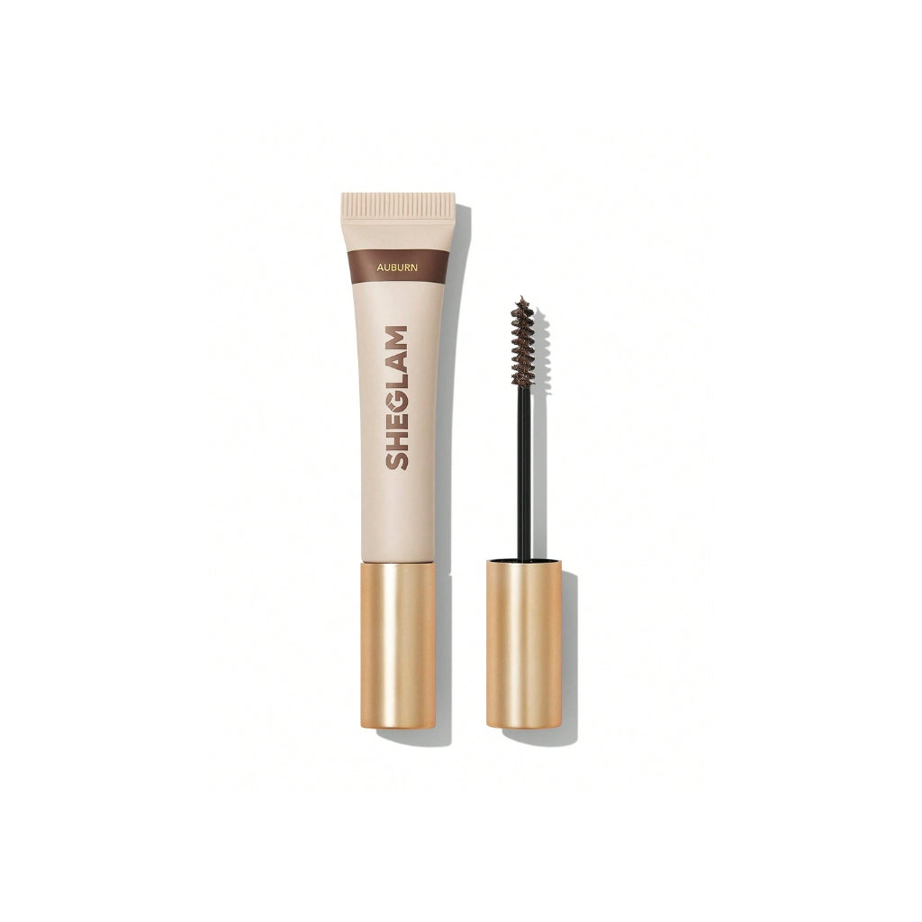 SHEGLAM Hold 'Em Up Tinted Brow Gel in Auburn shade for defined, lifted brows with a natural tinted hold.
