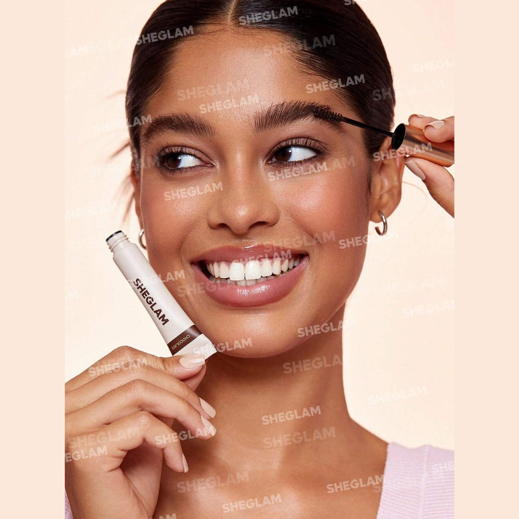 SHEGLAM Hold 'Em Up Tinted Brow Gel in Chocolate shade, tinted brow gel tube with spoolie applicator for shaping and setting brows.
