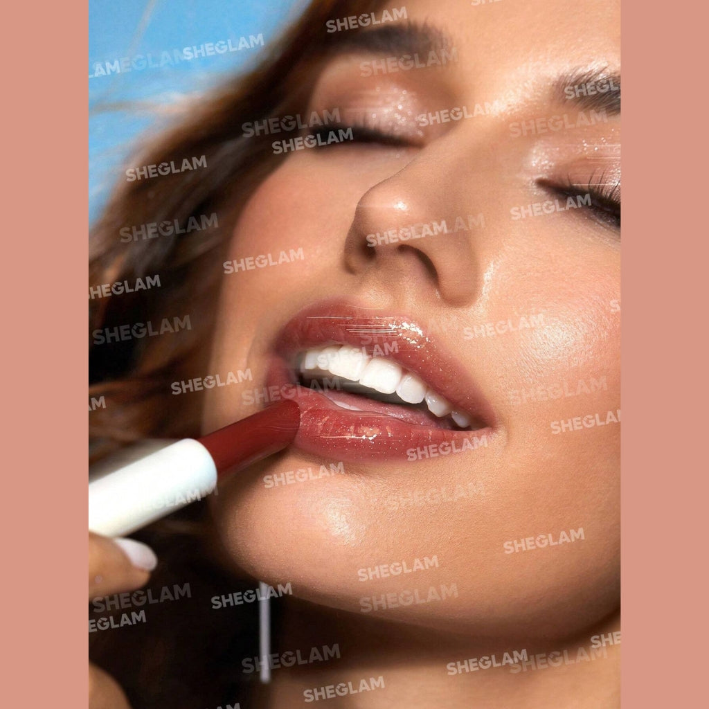 SHEGLAM Pout-Perfect Shimmer Lip Plumper in Gold Rush, solid golden glitter lip gloss stick on a clean background.

