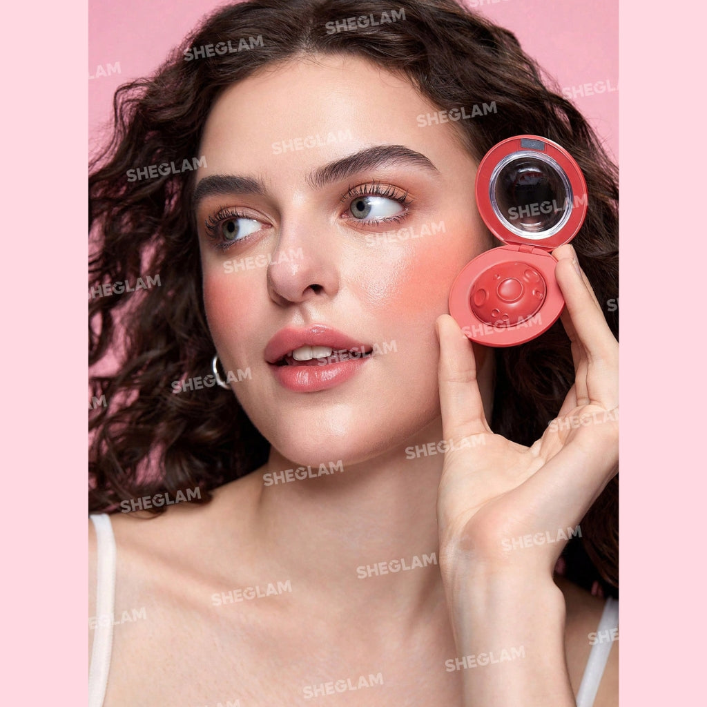 SHEGLAM Lunar Orbit Blush Ball in Ultraviolet, cream blush ball on a clean background.
