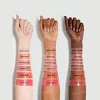 SHEGLAM Pout-Perfect Shimmer Lip Plumper in Violet Fizz, glitter solid lip gloss stick on a clean background.
