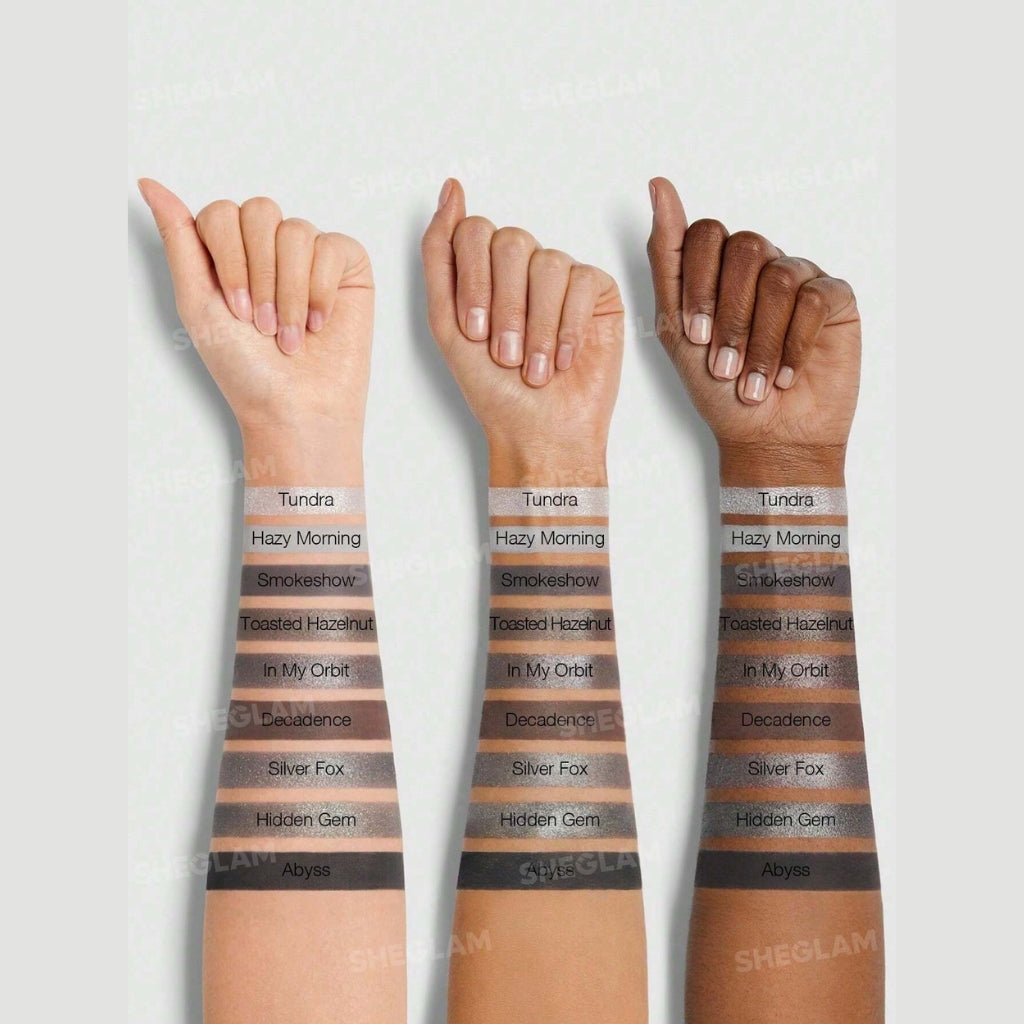 SHEGLAM Deep Feelings Eyeshadow Palette with 9 smoky grey, silver and black shades in matte, shimmer and glitter finishes.
