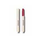 SHEGLAM Pout-Perfect Shine Lip Plumper Hot Stuff solid gloss stick with coconut oil for high-shine lips.
