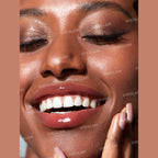 SHEGLAM Pout-Perfect Shine Lip Plumper Sepia Kiss solid gloss stick with high-shine finish.
