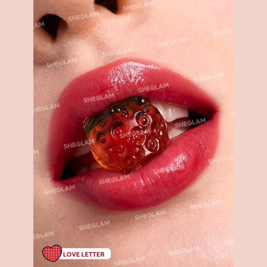 Hello Kitty x SHEGLAM Be My Baby Hydrating Lipstick in Love Letter shade with heart-core bullet and cute ring detail.
