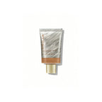 SHEGLAM Dew & Done Skin Tint with SPF20 in Almond shade, dewy light-to-medium coverage skin tint tube on a clean background.
