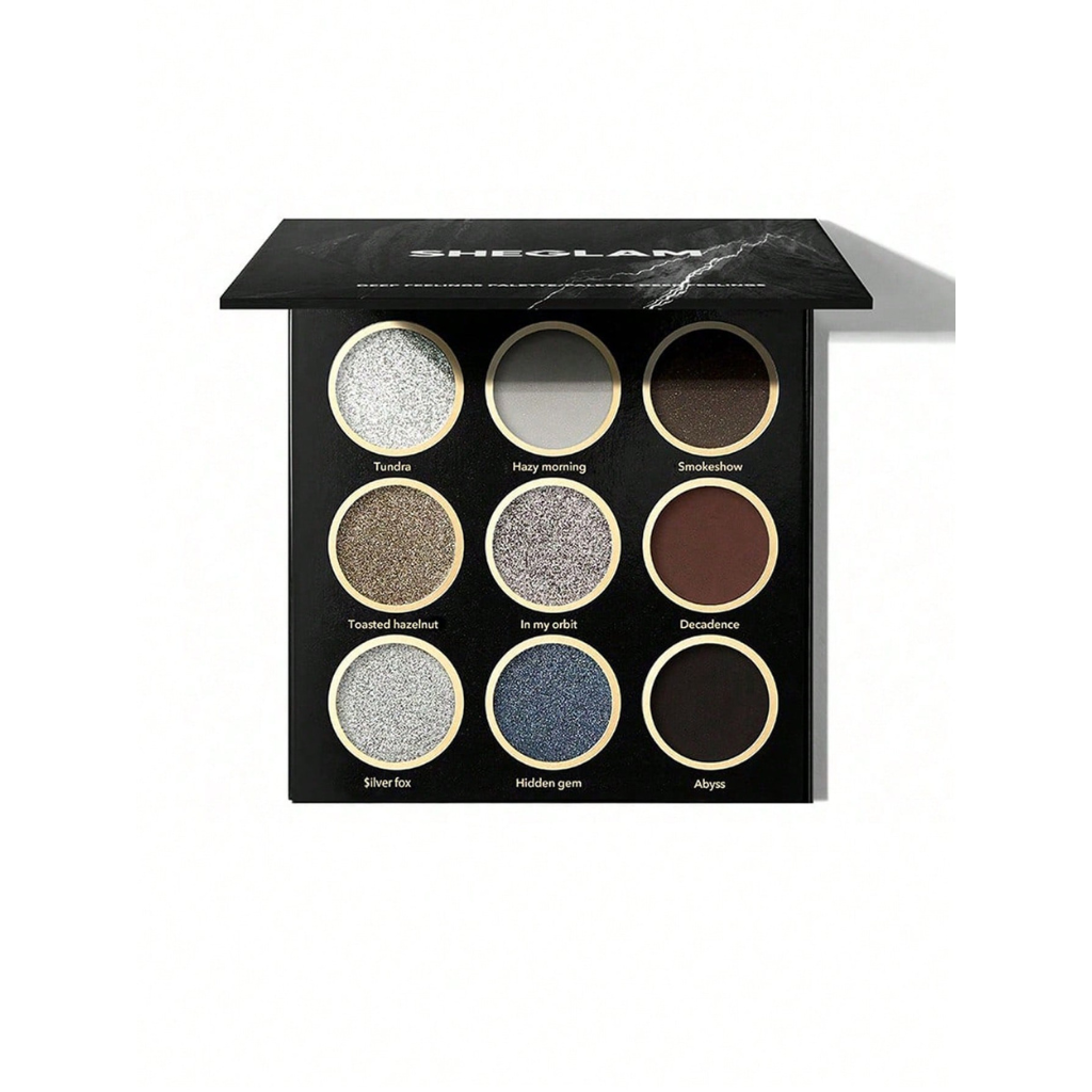 SHEGLAM Deep Feelings Palette with 9 smoky shades in greys, silvers, browns, black and chrome blue, featuring matte, shimmer and glitter finishes
