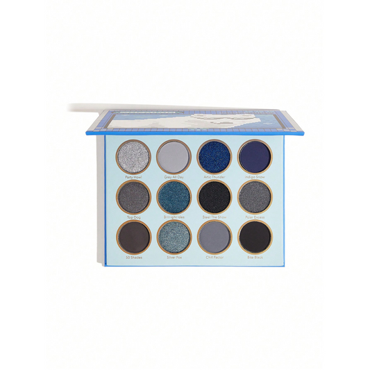 SHEGLAM Wolf Calls Eyeshadow Palette featuring 12 cool-toned blue and grey shades in matte and shimmer finishes
